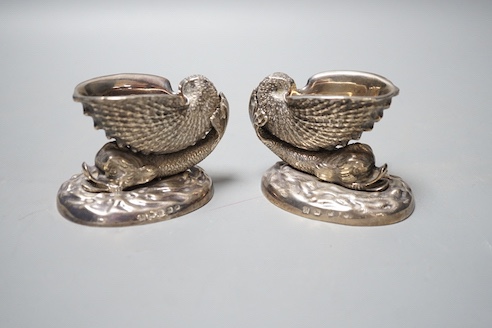 A pair of Victorian silver 'dolphin & shell' salts, John Knowles & Son, Sheffield, 1863, length 91mm, 25oz.